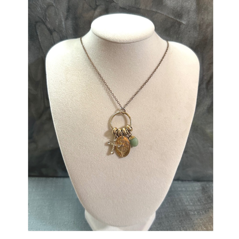 Gold Tone Multi Charm Necklace Cross Sunburst Medallion Green Stone Bead